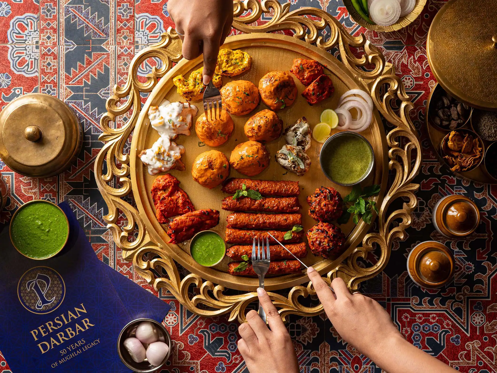 Platter of Persian Darbar's Mughlai and tandoori dishes for a family meal in Andheri West